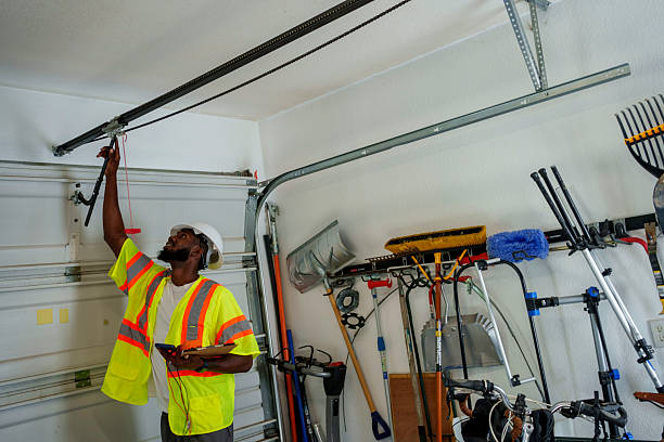 Professional Garage Door Installation technician working in Bude, MS